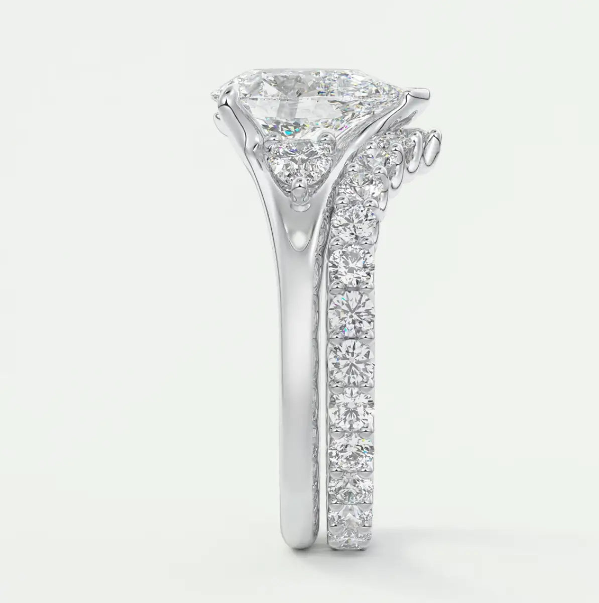 Custom made solena pear three-stone engagement ring with split shank | diamond lab