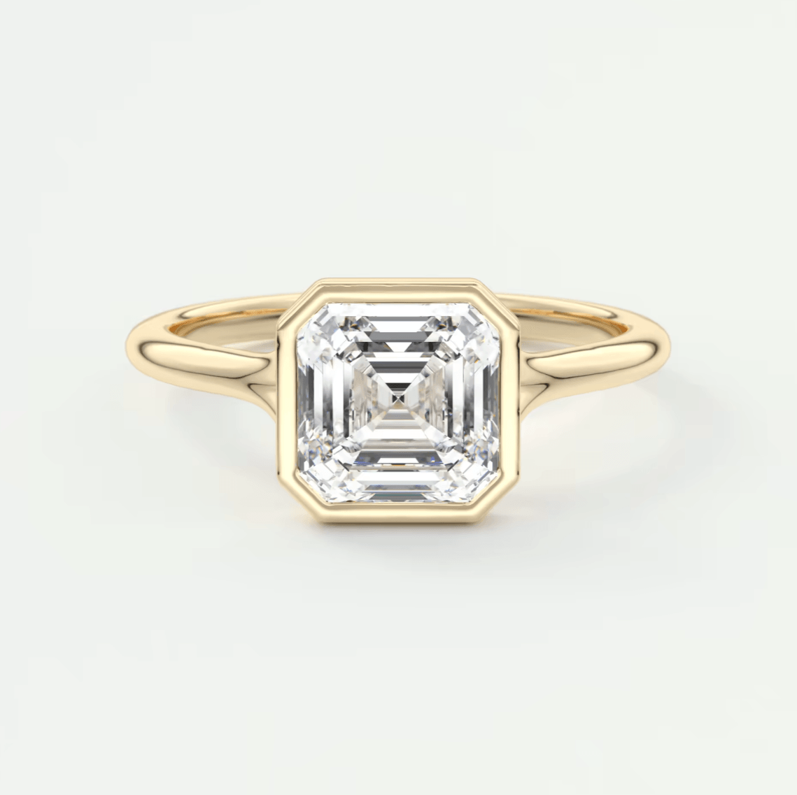 18k yellow gold asscher cut diamond engagement ring.