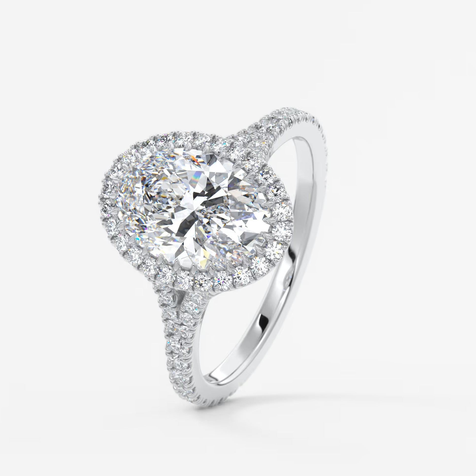 Aeris oval halo pavé bridge engagement ring