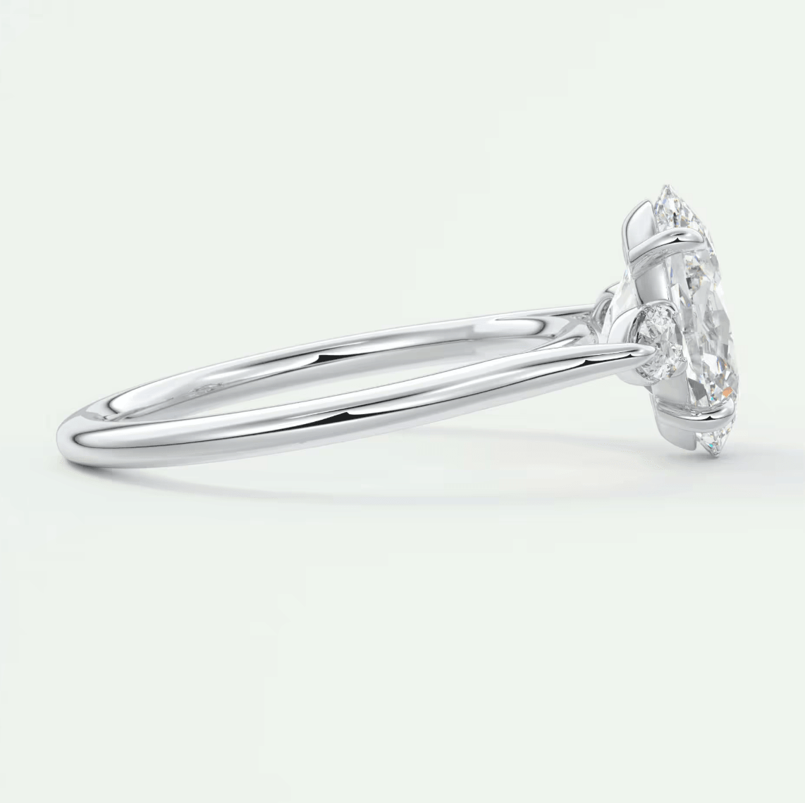 18k white gold engagement ring with a marquise-cut diamond.