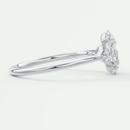 18k white gold engagement ring with a marquise-cut diamond.