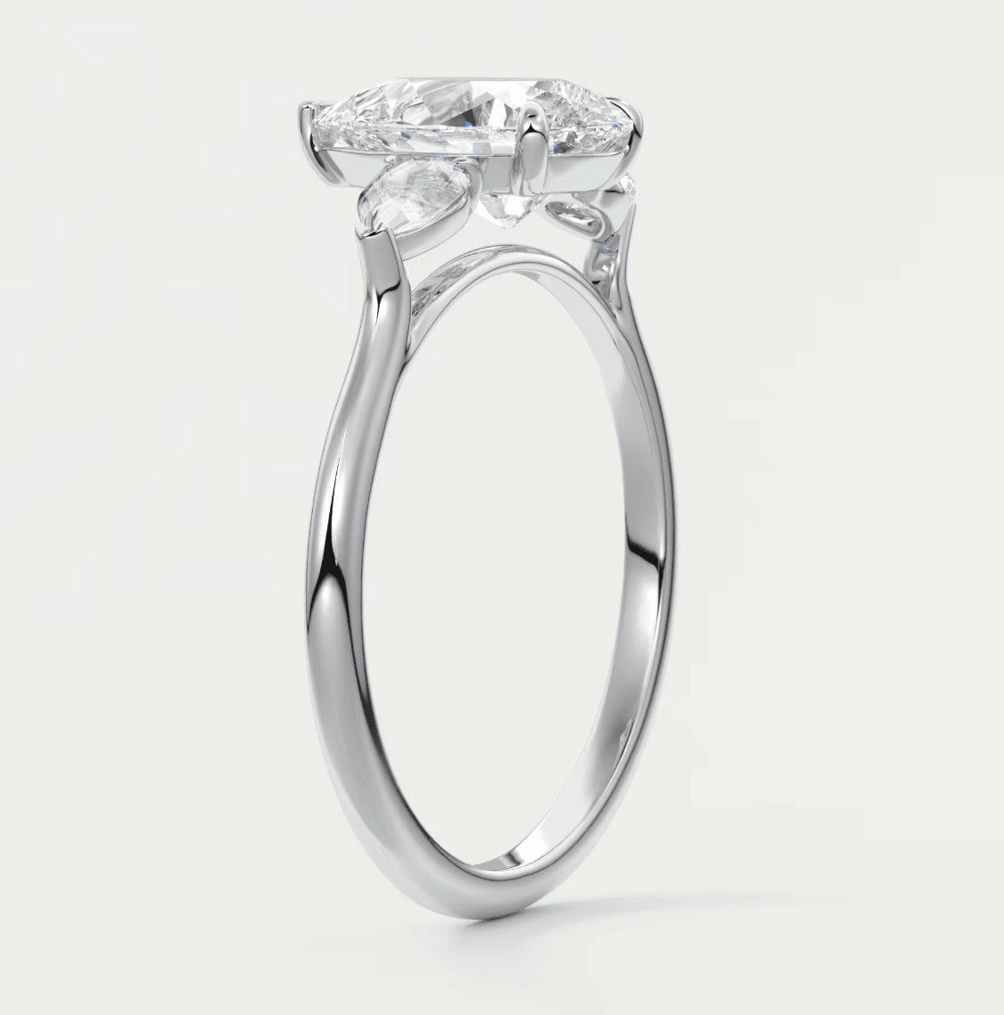 White gold engagement ring with a large, cushion-cut diamond.