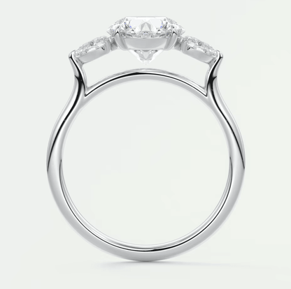 18k white gold engagement ring with three diamond stones.