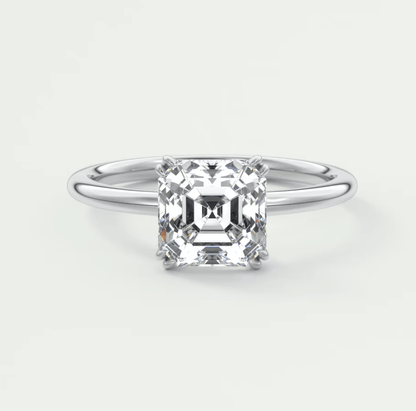 Princess cut diamond engagement ring with a white gold band.