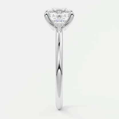 18-karat white gold engagement ring with a heart-shaped diamond.