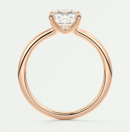 Rose gold engagement ring with a heart-shaped diamond.