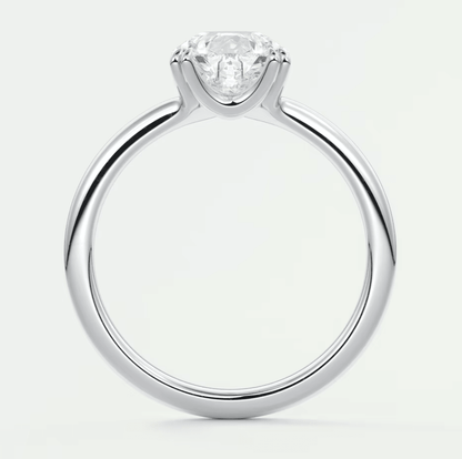 18k white gold solitaire diamond engagement ring.