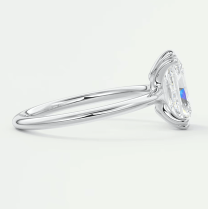 18k white gold engagement ring with a marquise-cut diamond.