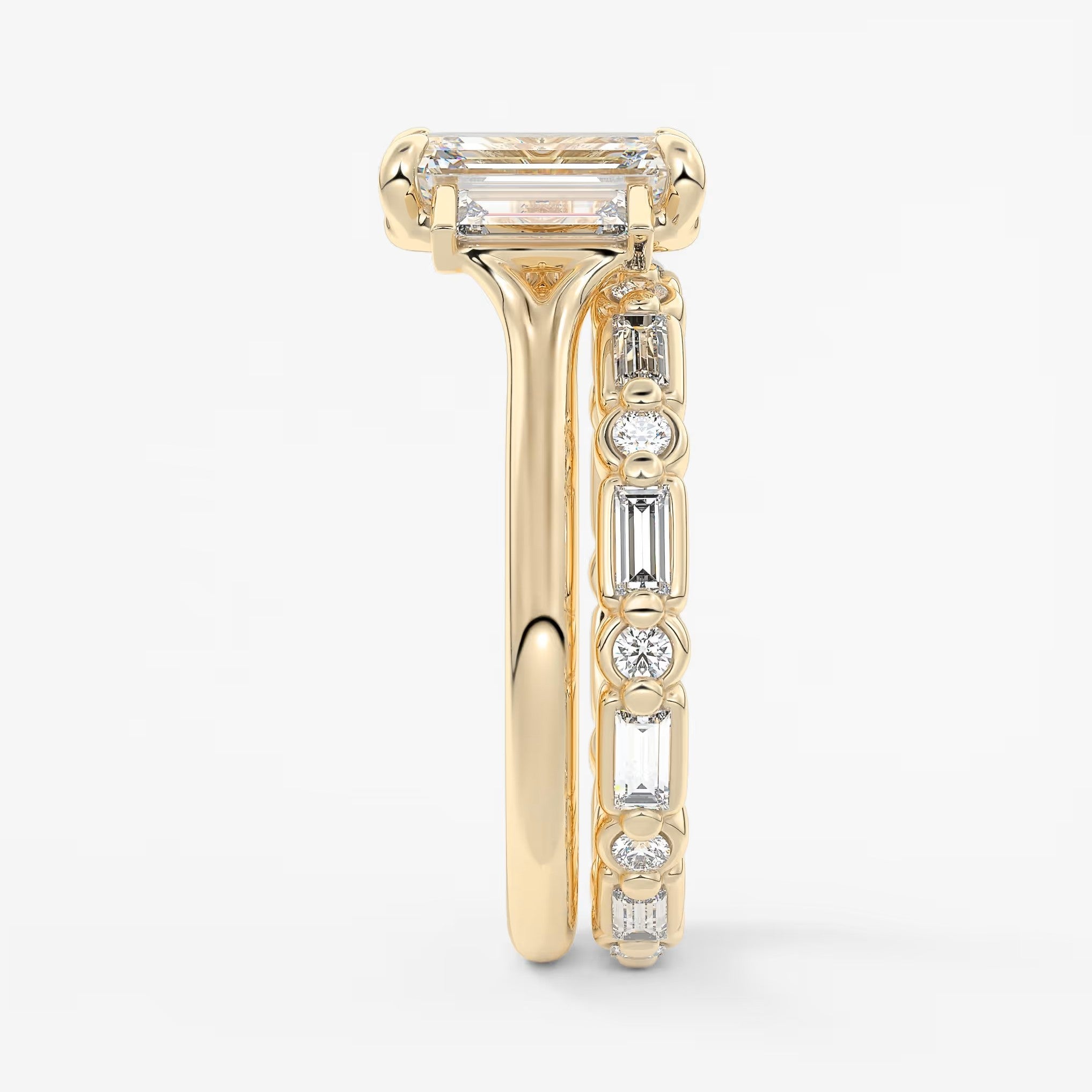 Aureline emerald baguette trilogy engagement ring