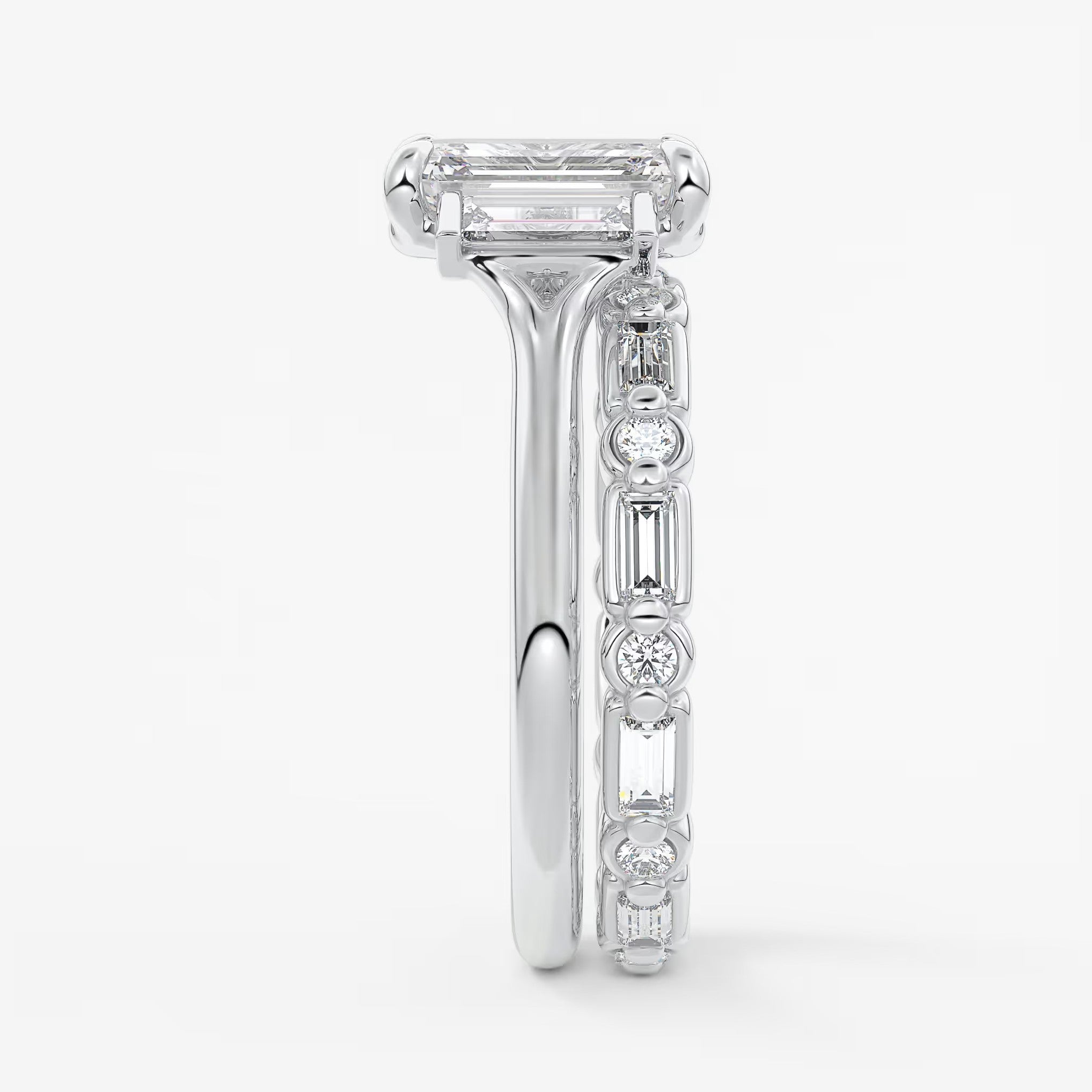 Aureline emerald baguette trilogy engagement ring