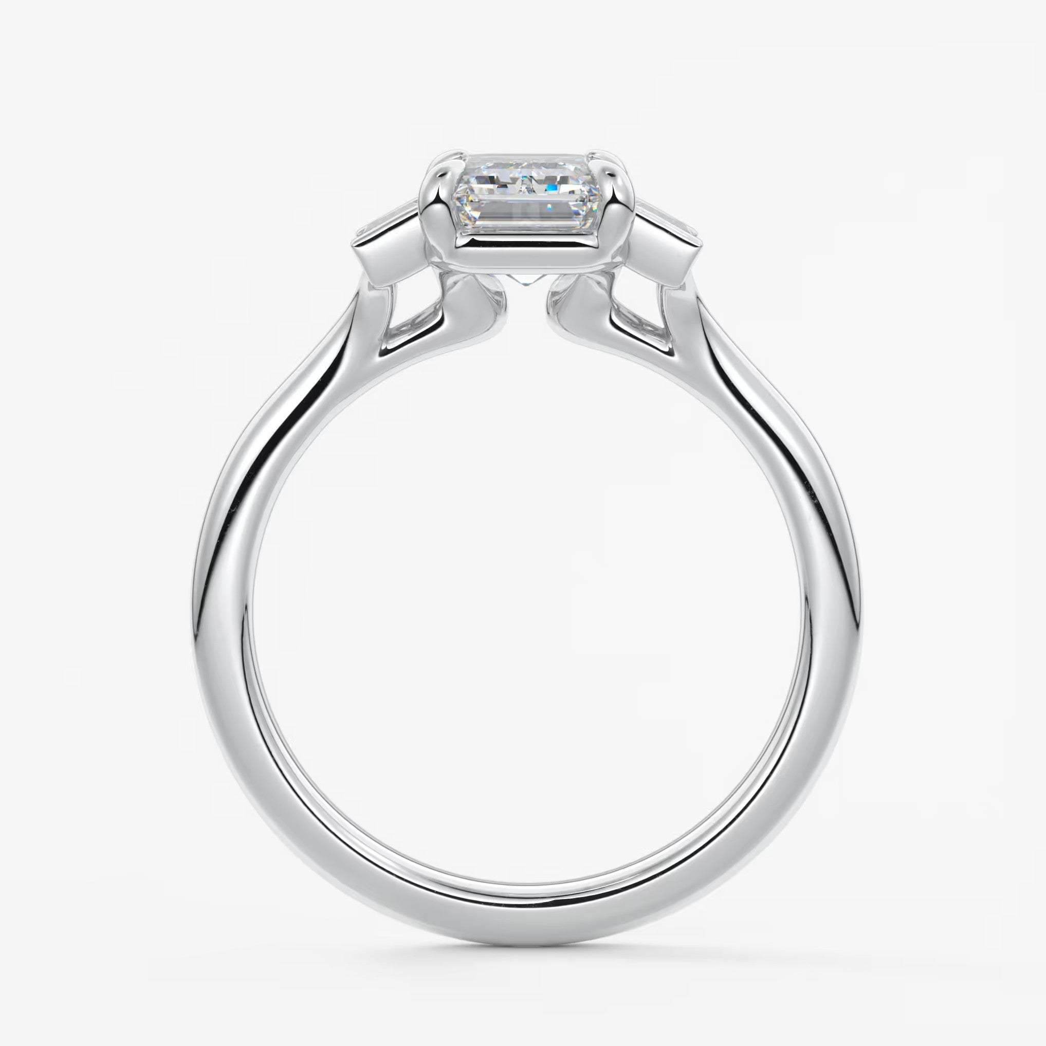 Aureline emerald baguette trilogy engagement ring