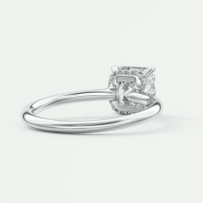 Princess cut diamond engagement ring with white gold band and prong setting.