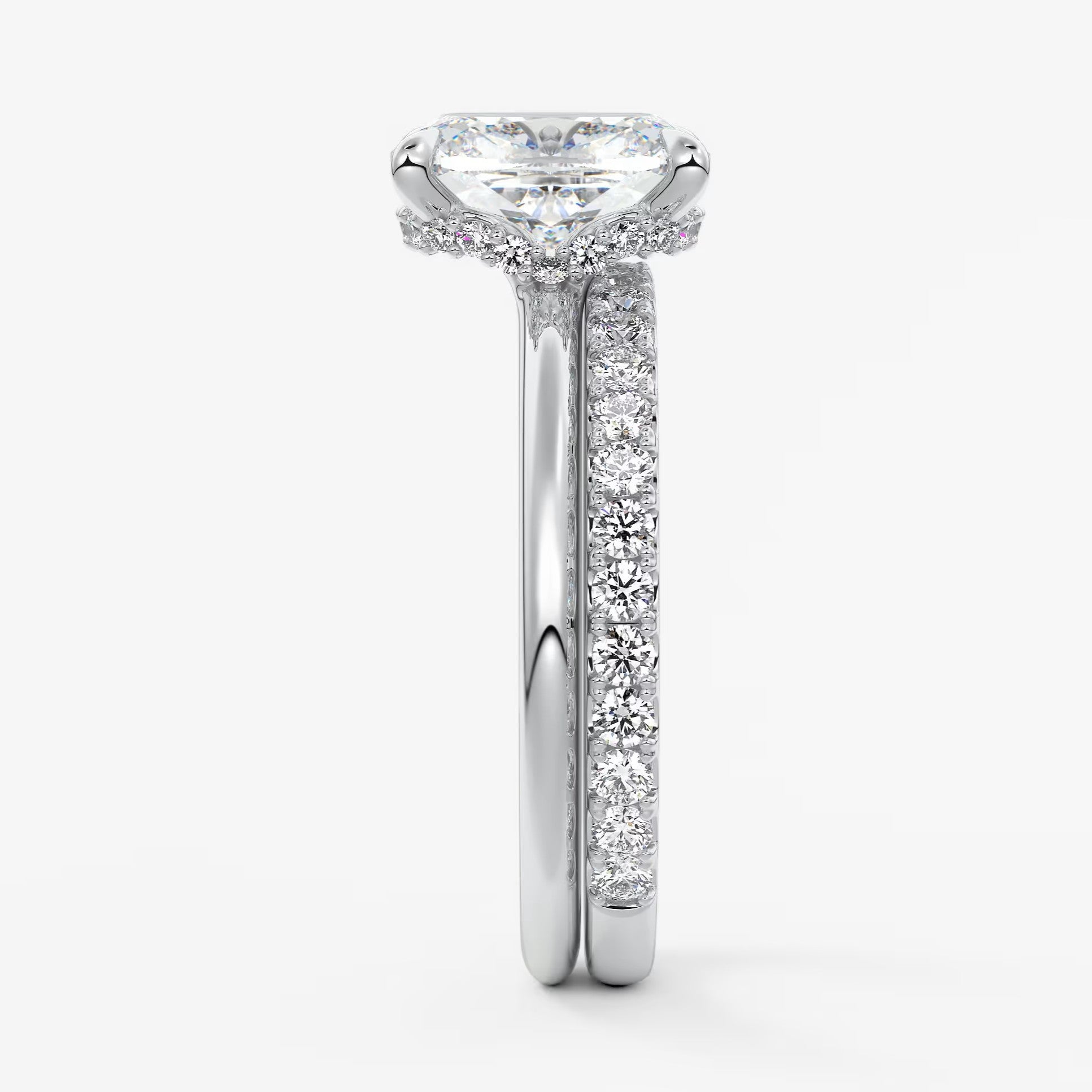 Aurora elongated cushion hidden halo engagement ring