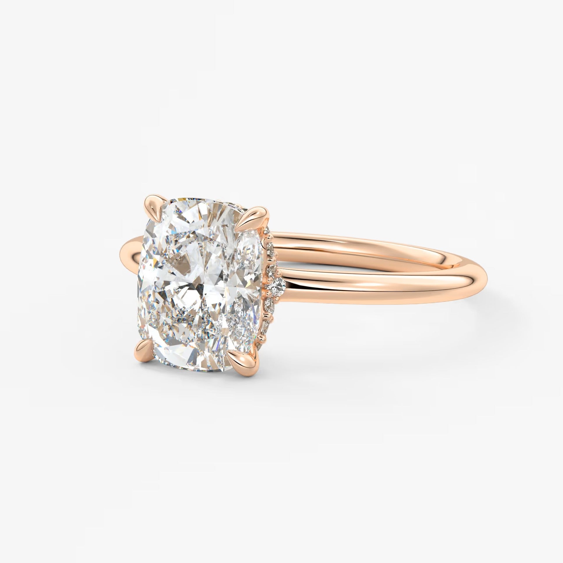 Aurora elongated cushion hidden halo engagement ring