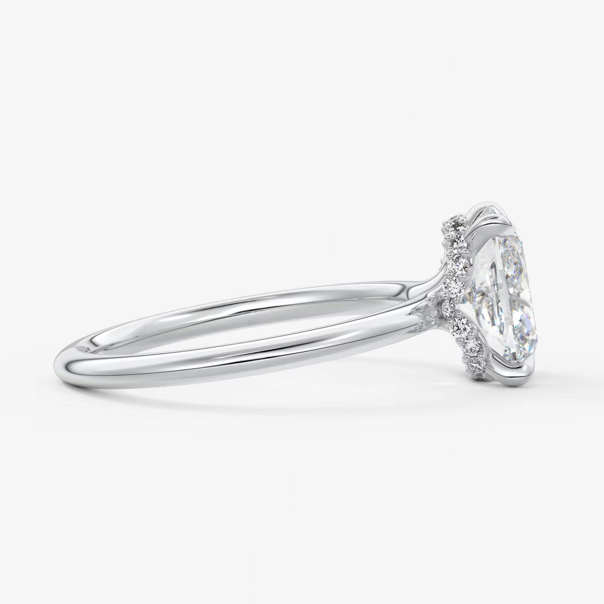 Aurora elongated cushion hidden halo engagement ring