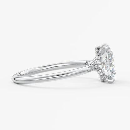 Aurora elongated cushion hidden halo engagement ring
