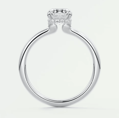White gold diamond engagement ring with a halo design and pave set diamonds on the band.