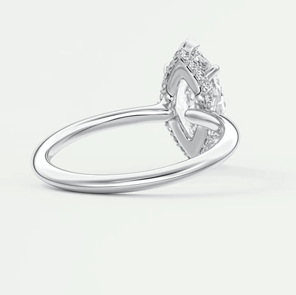 18k white gold diamond engagement ring with a heart-shaped halo.