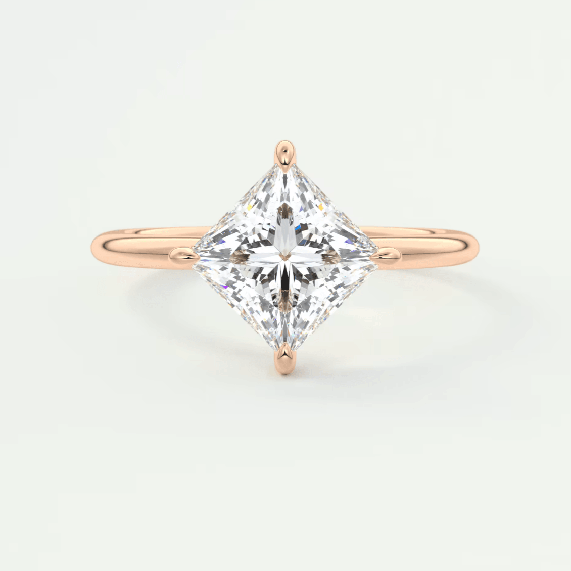18k rose gold princess cut diamond engagement ring.