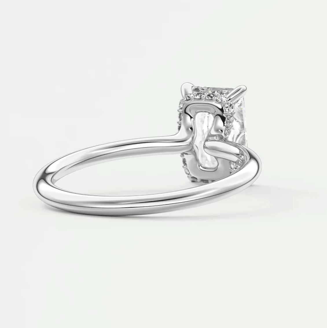 Princess cut diamond engagement ring with four prongs, white gold or platinum.
