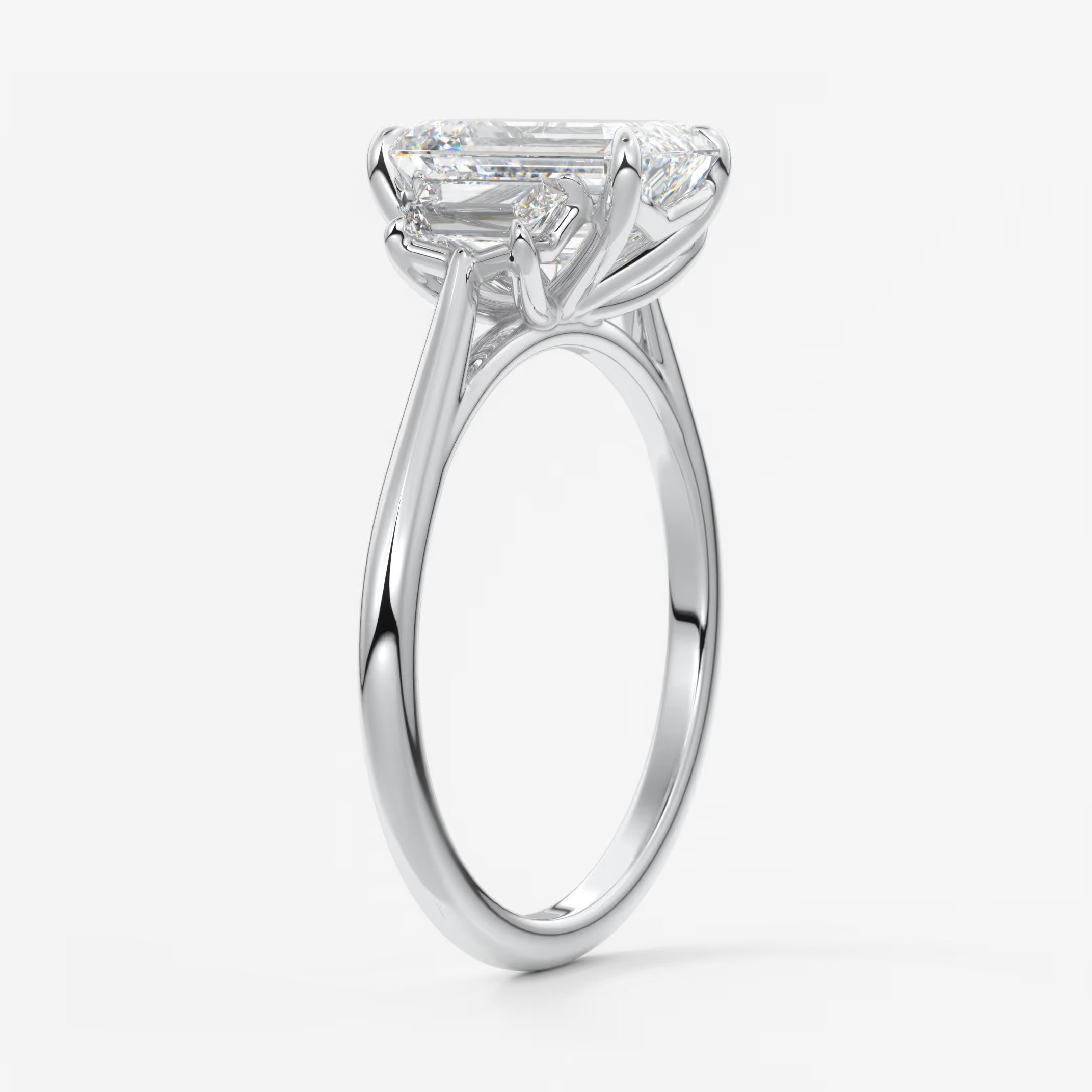Calista emerald trapezoid cathedral engagement ring