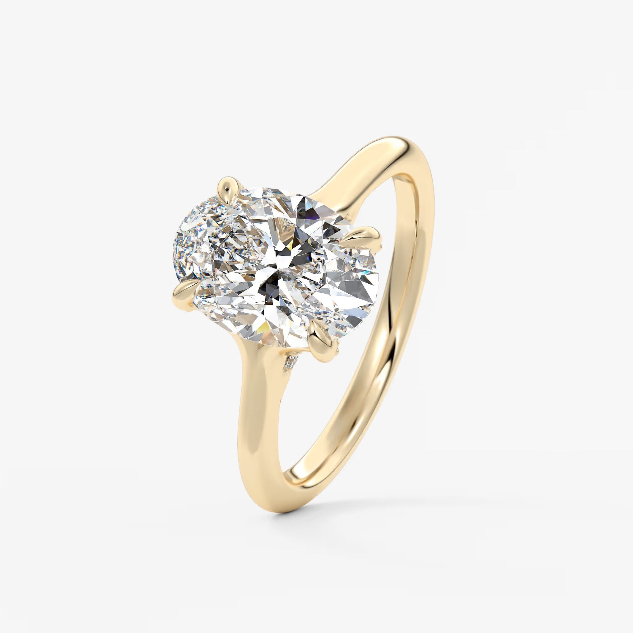 Cassia – oval solitaire with hidden pavé