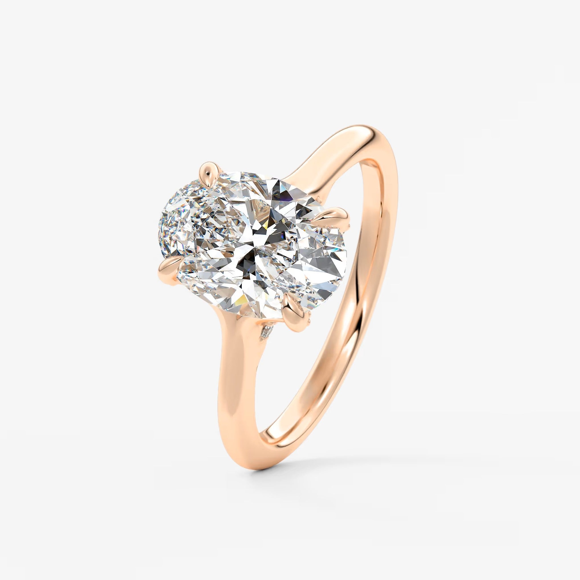 Cassia – oval solitaire with hidden pavé
