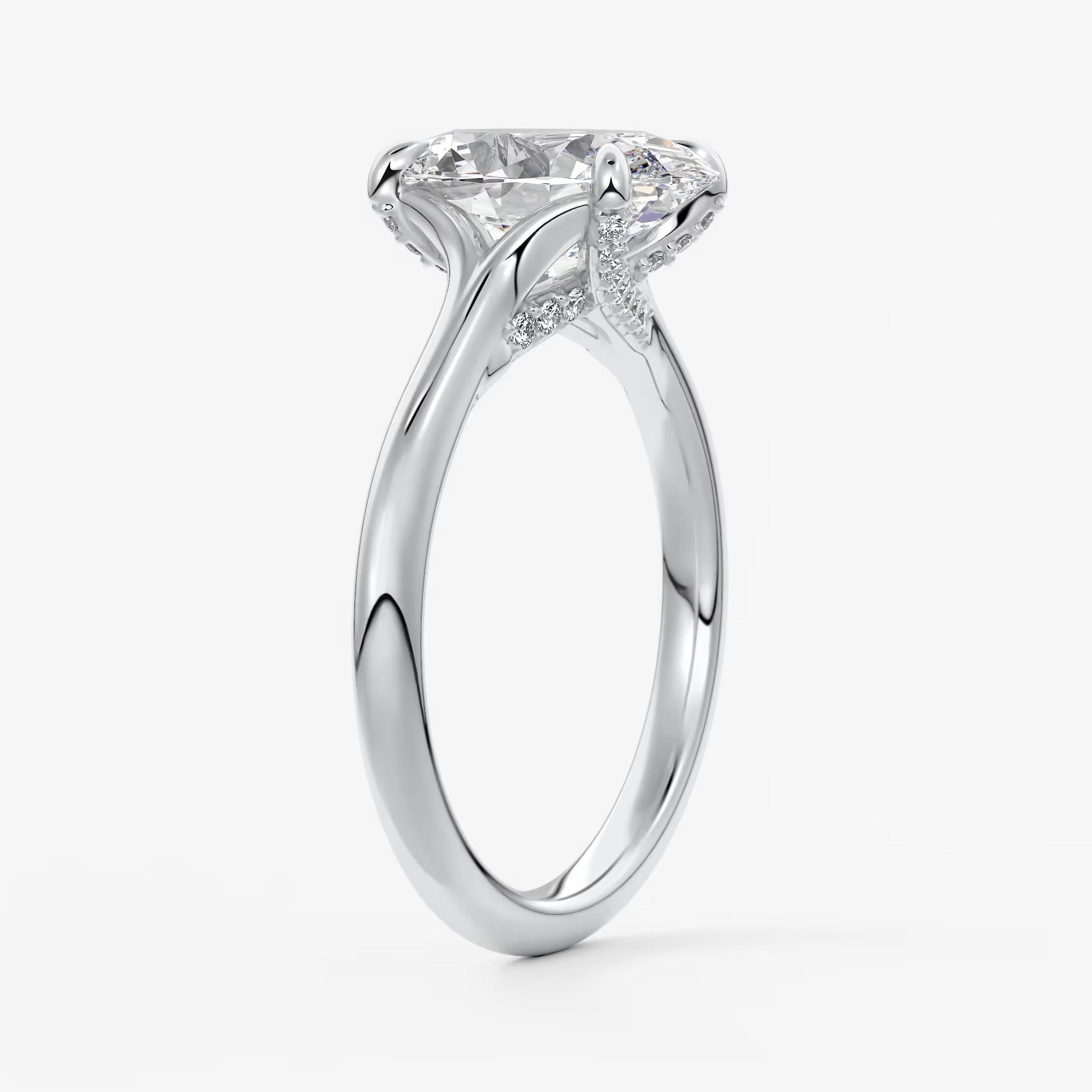 Cassia – oval solitaire with hidden pavé