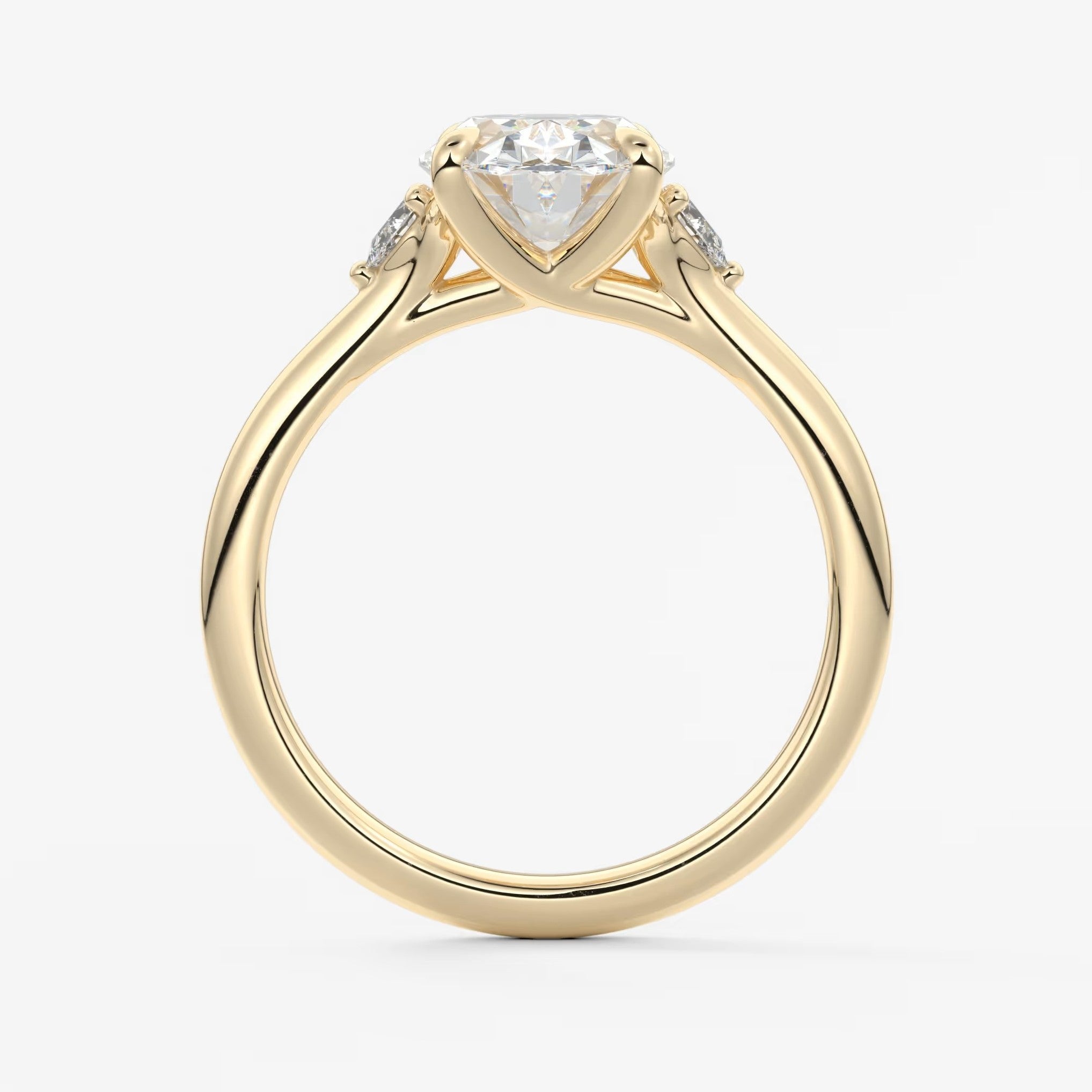 Cassia – oval trilogy with pear side stones