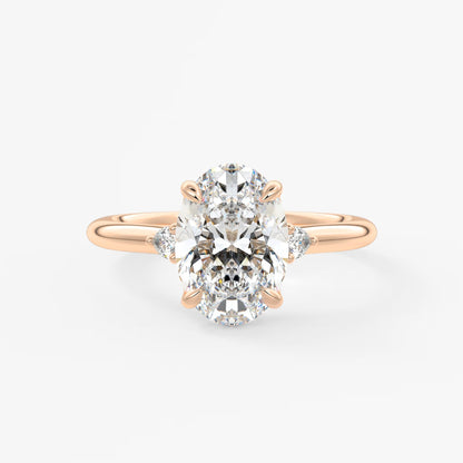Cassia – oval trilogy with pear side stones