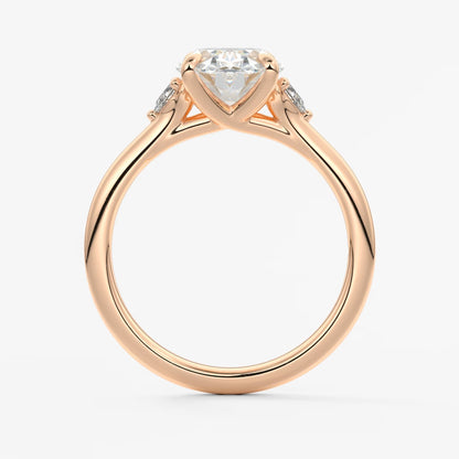 Cassia – oval trilogy with pear side stones