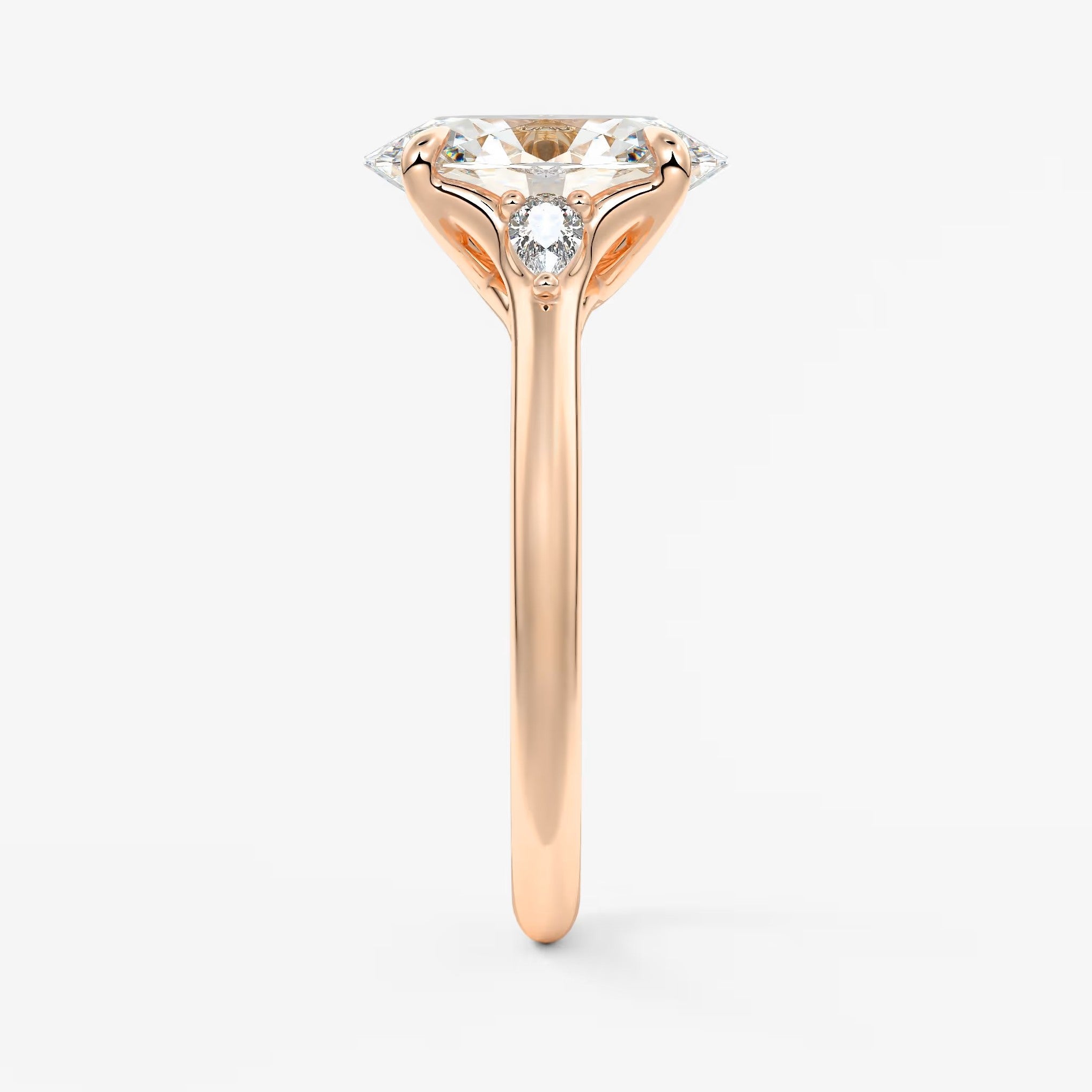 Cassia – oval trilogy with pear side stones