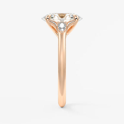 Cassia – oval trilogy with pear side stones