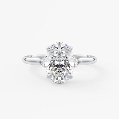 Cassia – oval trilogy with pear side stones