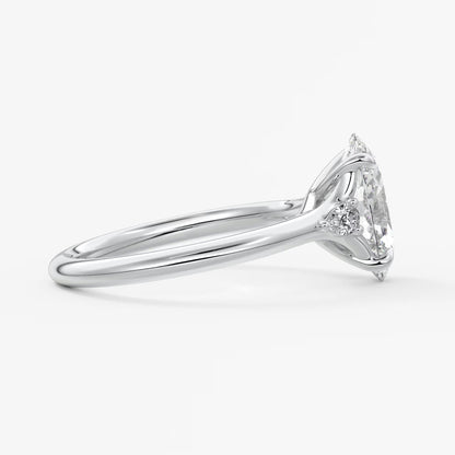 Cassia – oval trilogy with pear side stones