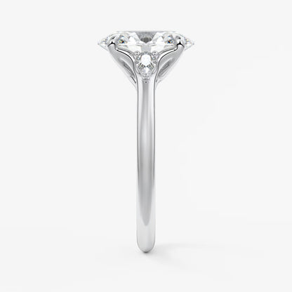 Cassia – oval trilogy with pear side stones