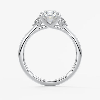 Cassia – oval trilogy with pear side stones