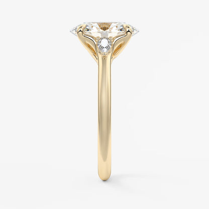 Cassia – oval trilogy with pear side stones