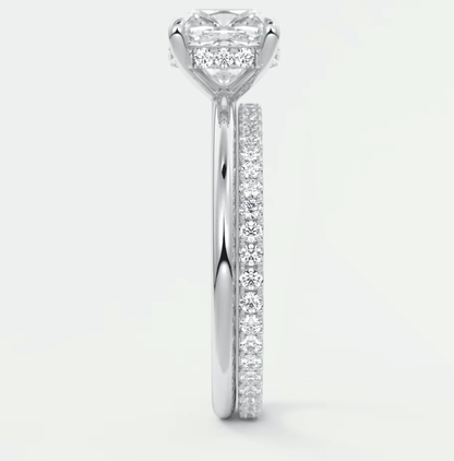 18k white gold princess cut diamond engagement ring with a pave band.