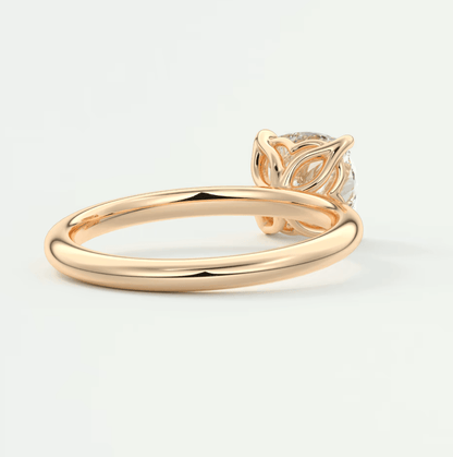 18k gold diamond engagement ring with leaf design.