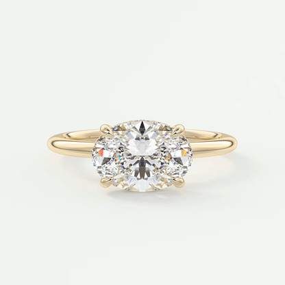 18k yellow gold diamond engagement ring with a round brilliant cut gem.