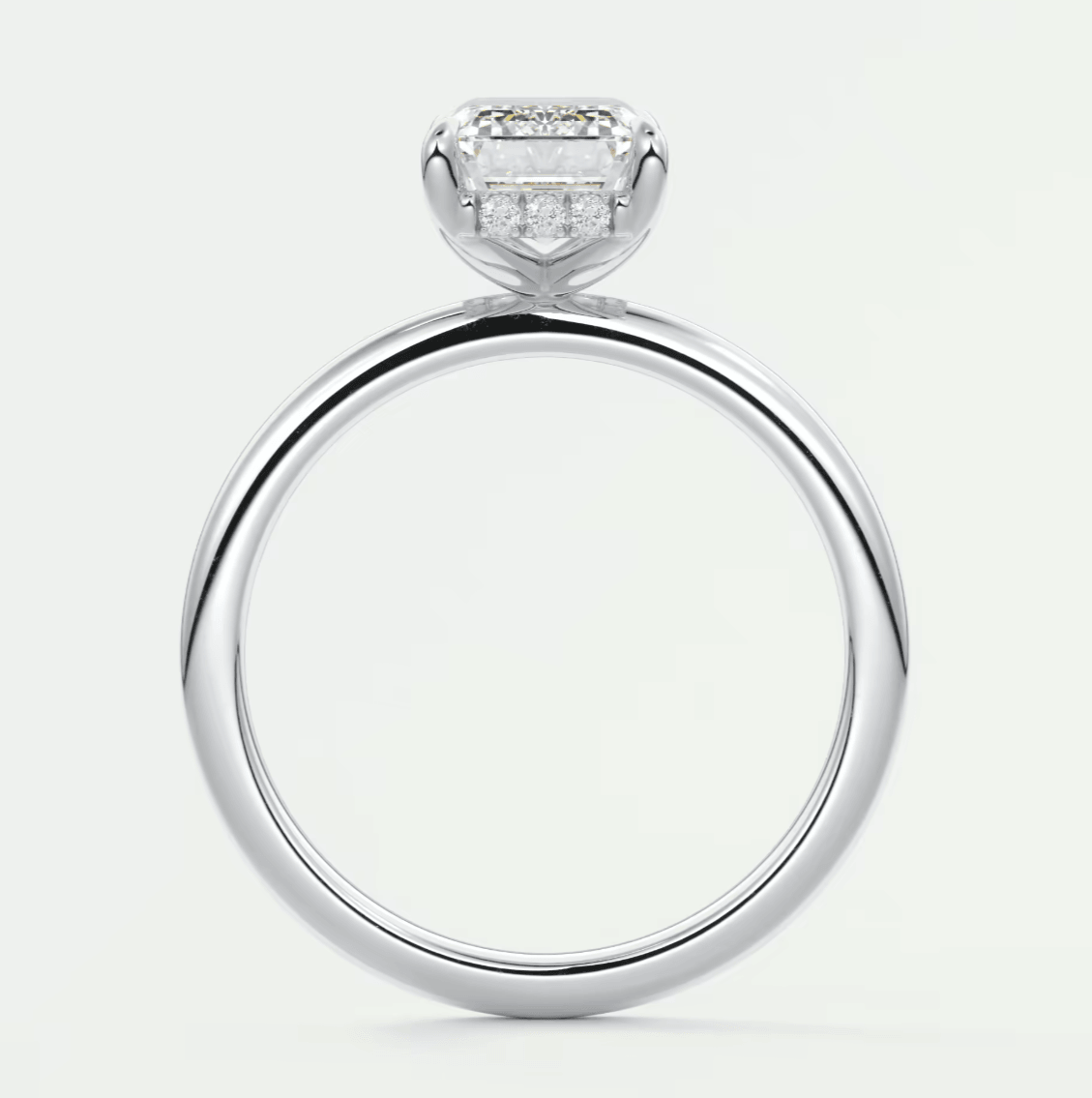 18k white gold engagement ring with a princess cut diamond.