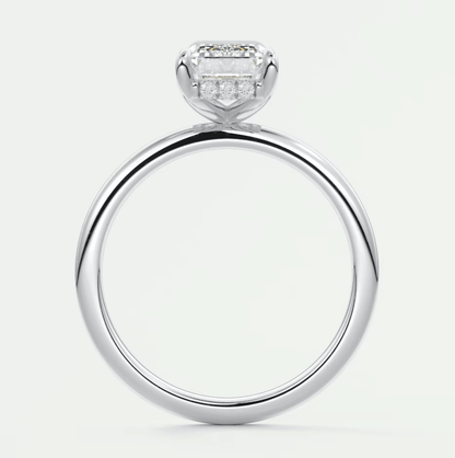 18k white gold engagement ring with a princess cut diamond.