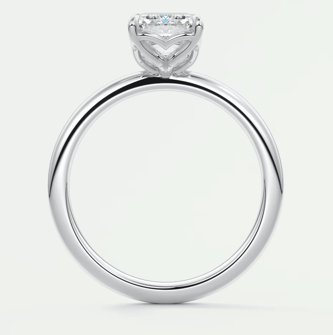 18k white gold engagement ring with a princess cut diamond.