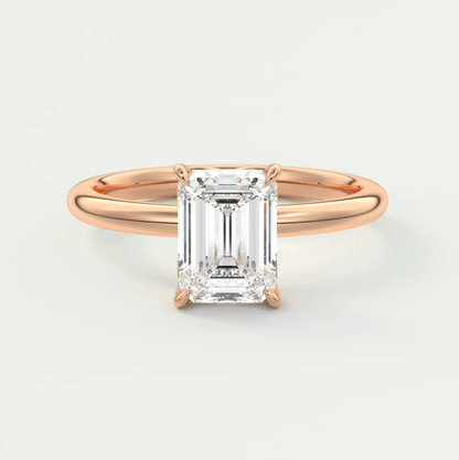 18k rose gold emerald cut diamond engagement ring.