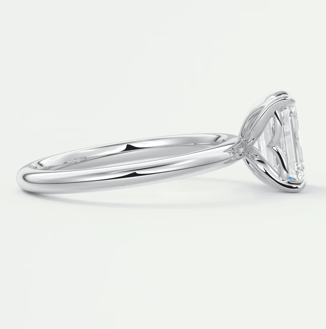 18k white gold emerald cut diamond engagement ring.