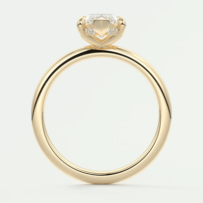 18k yellow gold engagement ring with a cushion-cut diamond and small round diamonds on the band.