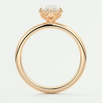 18k yellow gold engagement ring with a princess cut diamond.