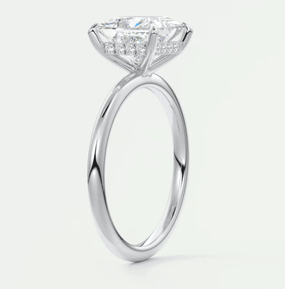 18k white gold engagement ring with princess cut diamond and halo design.