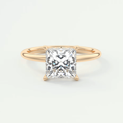 18k rose gold princess cut diamond engagement ring.